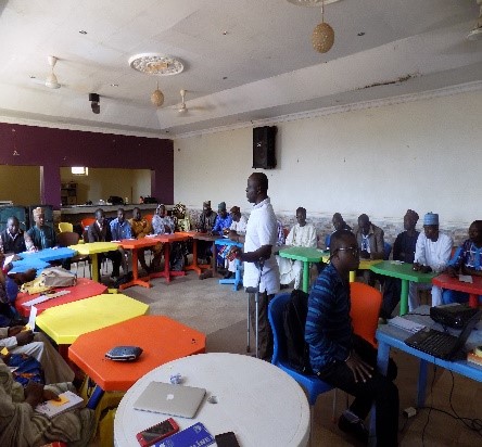 Community members being trained on how to draw up Community Demand Charters